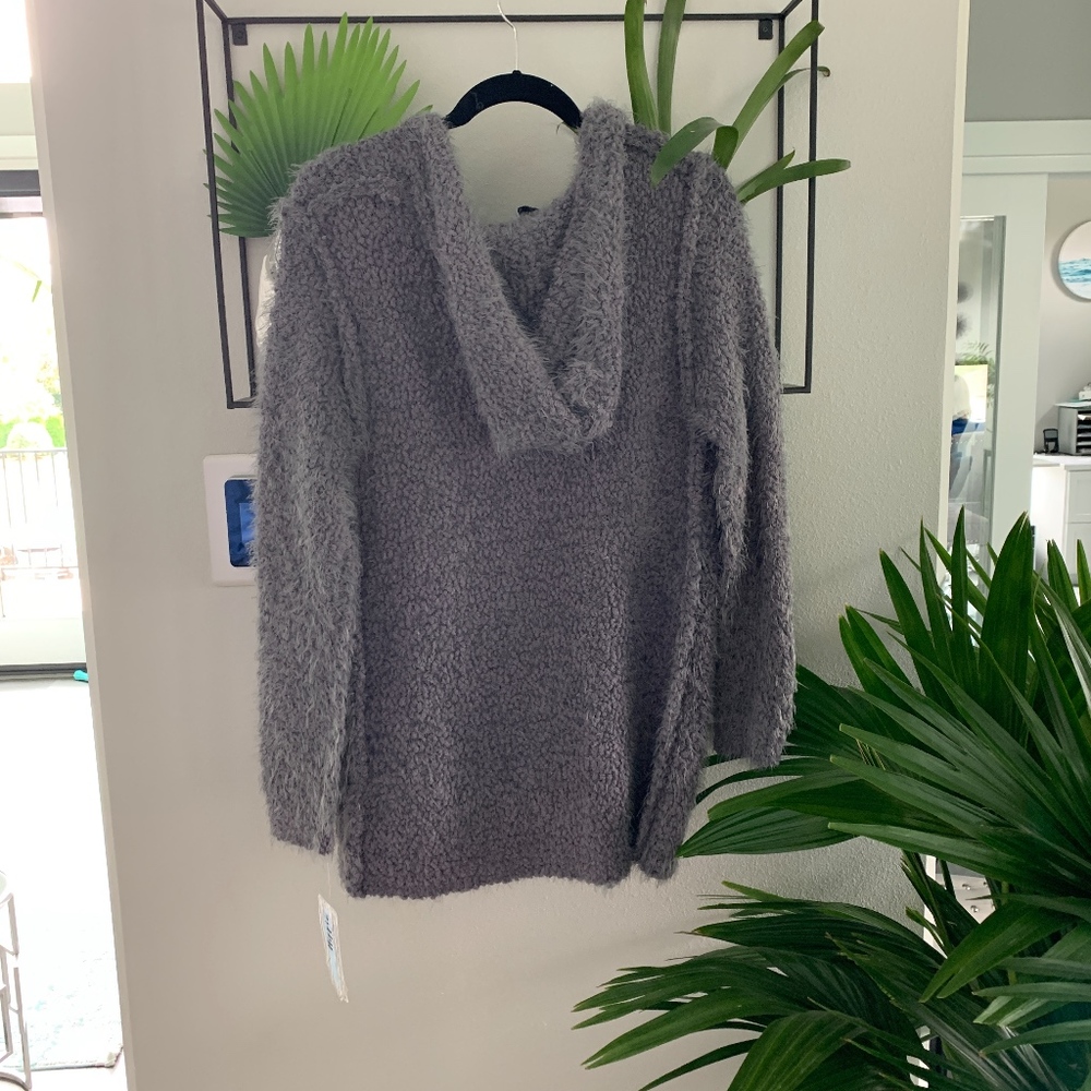Brand new with tags, fuzzy cardigan.